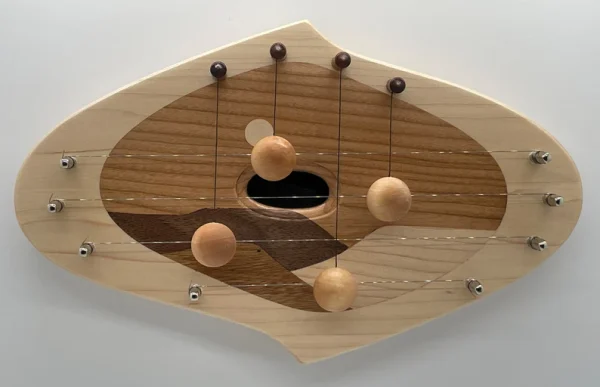 DH4MBCDEC- 4 String door harp with Maple border and decorative Cherry inlay.