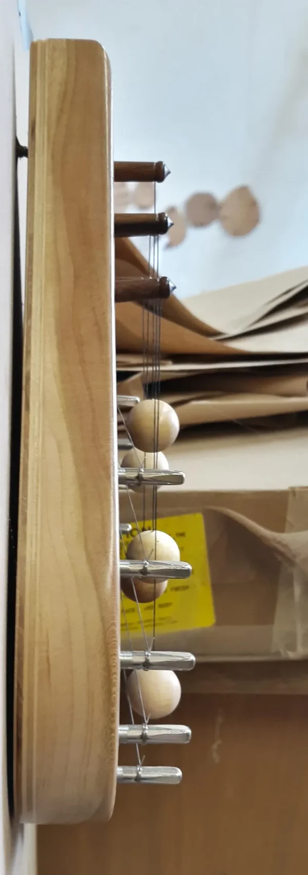 DH3MBWSIMX-3 String Door Harp with solid Maple border and solid Walnut inlay. Inlay has a cross shaped sound hole. - Image 2